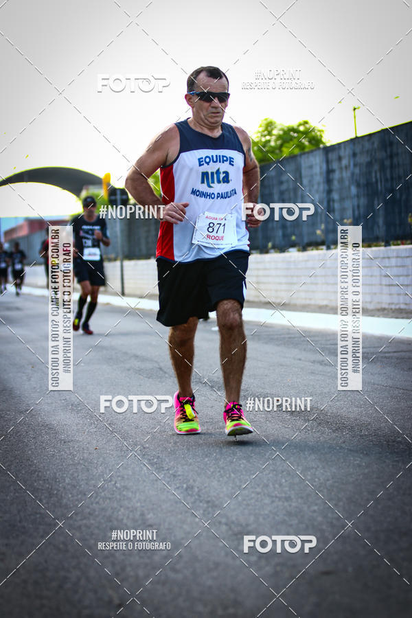 Buy your photos of the eventguia 13K Praia Grande on Fotop