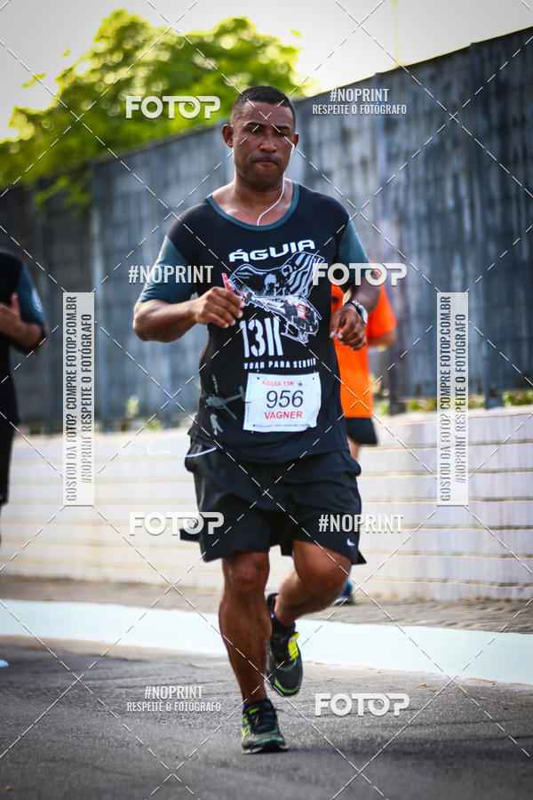 Buy your photos of the eventguia 13K Praia Grande on Fotop