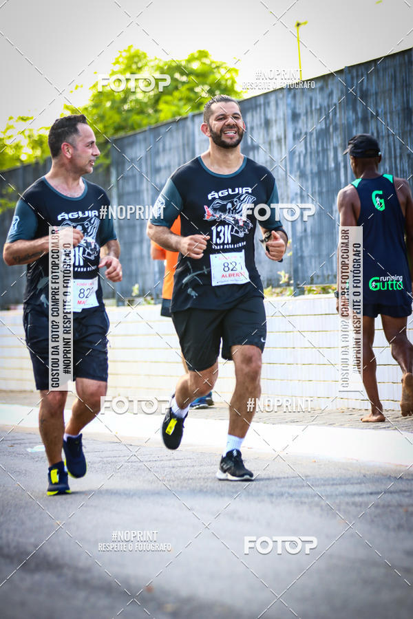 Buy your photos of the eventguia 13K Praia Grande on Fotop