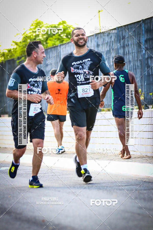 Buy your photos of the eventguia 13K Praia Grande on Fotop