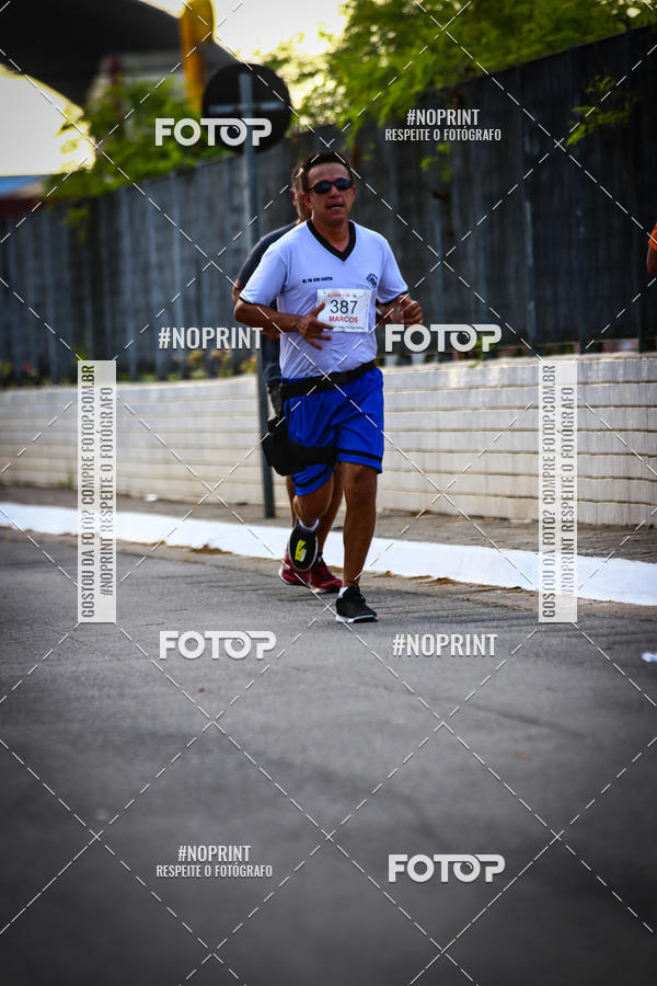 Buy your photos of the eventguia 13K Praia Grande on Fotop