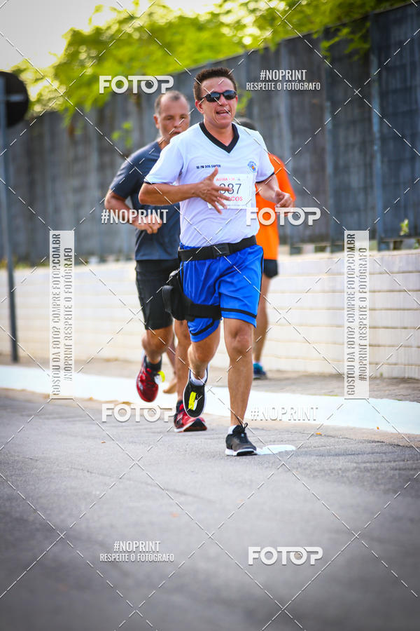Buy your photos of the eventguia 13K Praia Grande on Fotop