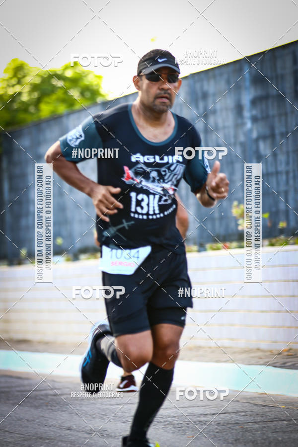 Buy your photos of the eventguia 13K Praia Grande on Fotop