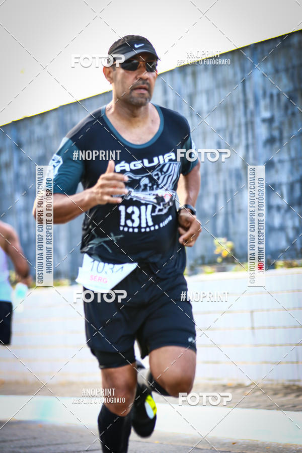 Buy your photos of the eventguia 13K Praia Grande on Fotop