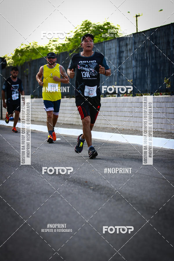 Buy your photos of the eventguia 13K Praia Grande on Fotop