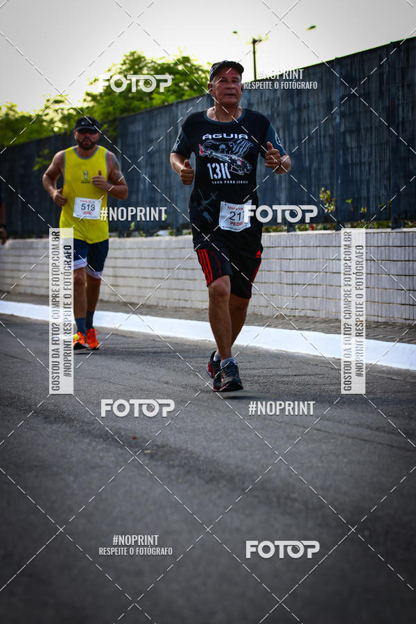 Buy your photos of the eventguia 13K Praia Grande on Fotop