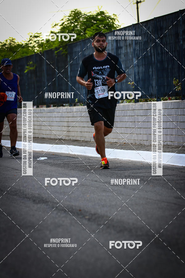 Buy your photos of the eventguia 13K Praia Grande on Fotop