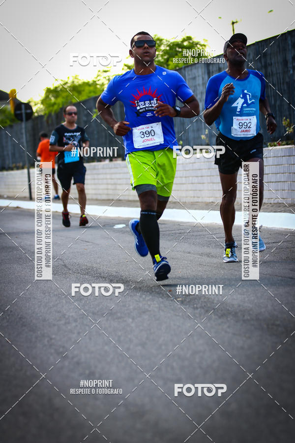 Buy your photos of the eventguia 13K Praia Grande on Fotop