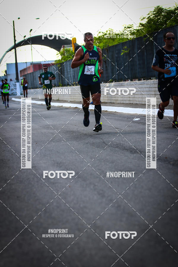 Buy your photos of the eventguia 13K Praia Grande on Fotop