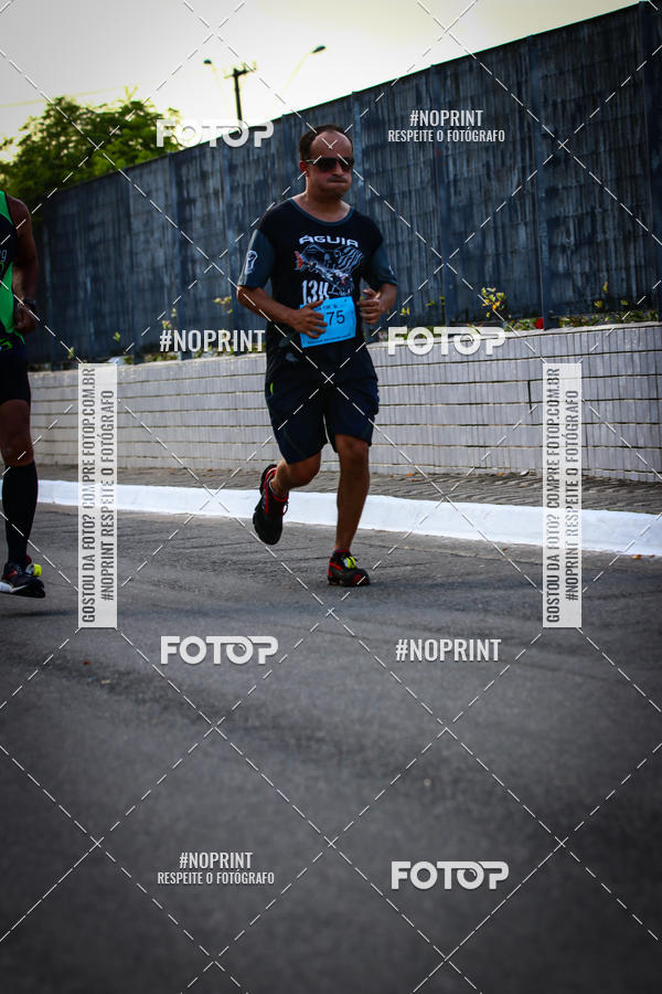 Buy your photos of the eventguia 13K Praia Grande on Fotop