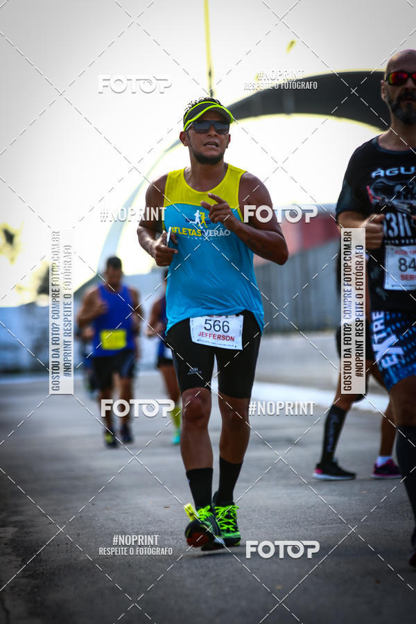 Buy your photos of the eventguia 13K Praia Grande on Fotop