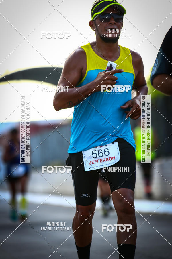 Buy your photos of the eventguia 13K Praia Grande on Fotop