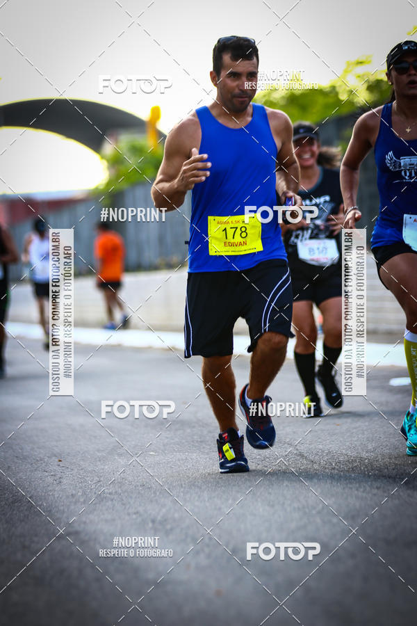 Buy your photos of the eventguia 13K Praia Grande on Fotop