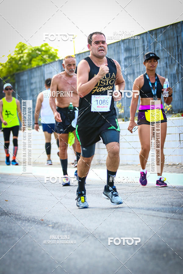 Buy your photos of the eventguia 13K Praia Grande on Fotop