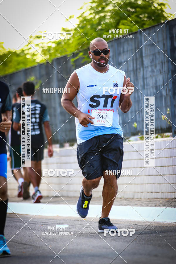 Buy your photos of the eventguia 13K Praia Grande on Fotop