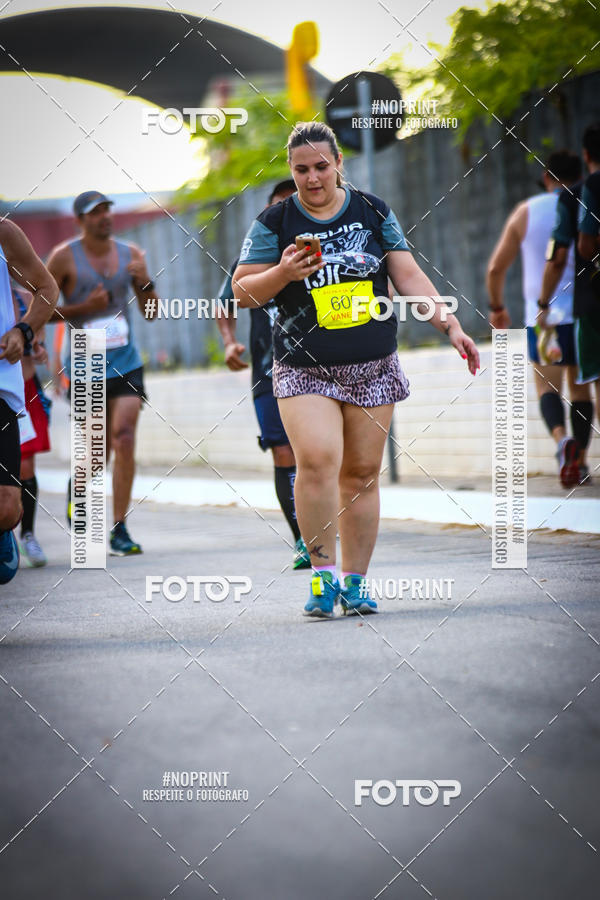 Buy your photos of the eventguia 13K Praia Grande on Fotop