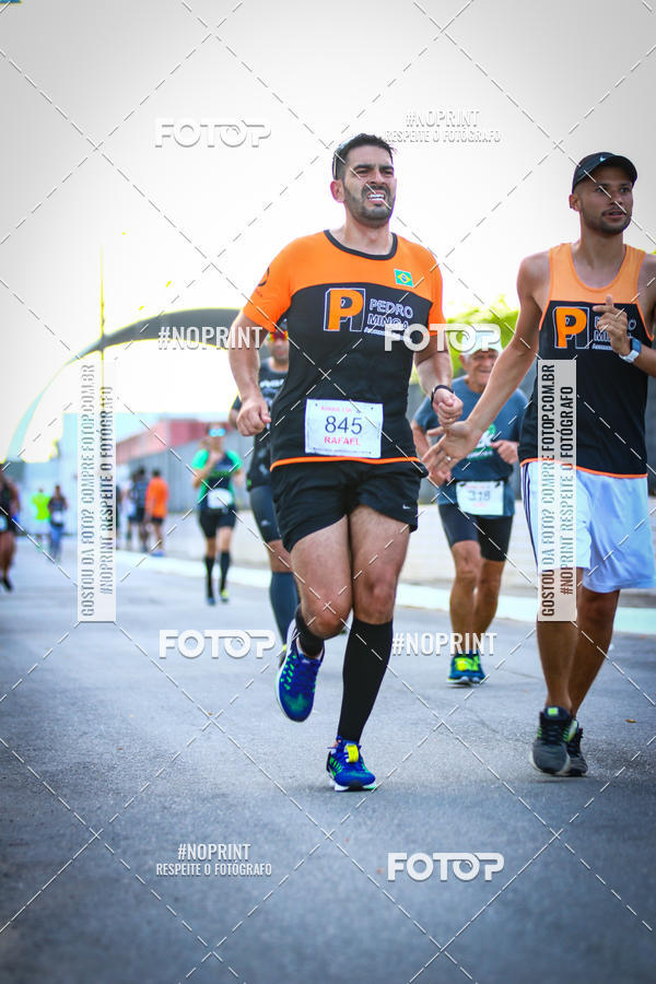 Buy your photos of the eventguia 13K Praia Grande on Fotop