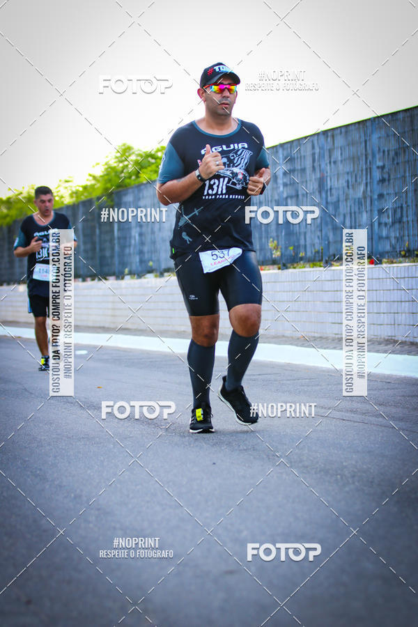 Buy your photos of the eventguia 13K Praia Grande on Fotop