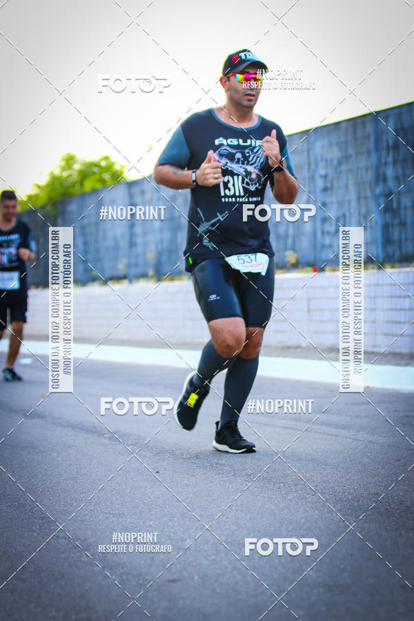 Buy your photos of the eventguia 13K Praia Grande on Fotop