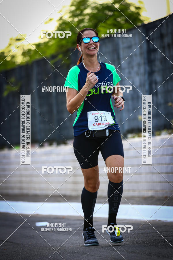 Buy your photos of the eventguia 13K Praia Grande on Fotop
