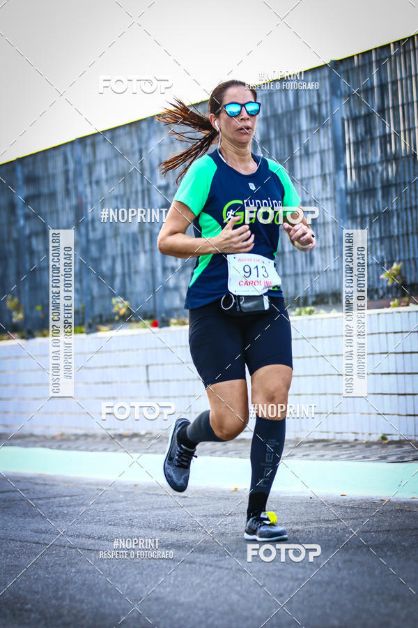 Buy your photos of the eventguia 13K Praia Grande on Fotop