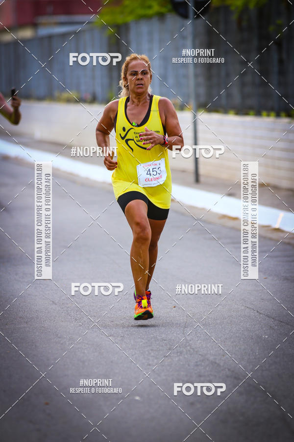 Buy your photos of the eventguia 13K Praia Grande on Fotop