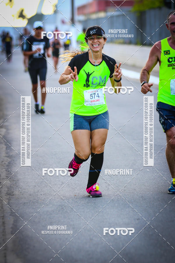 Buy your photos of the eventguia 13K Praia Grande on Fotop