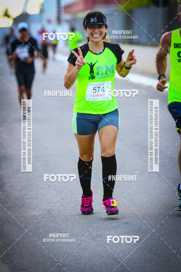 Buy your photos of the eventguia 13K Praia Grande on Fotop