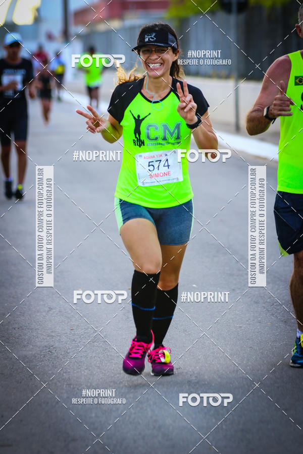Buy your photos of the eventguia 13K Praia Grande on Fotop