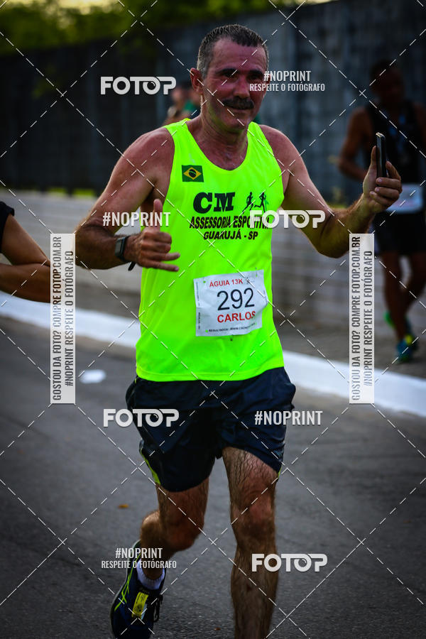 Buy your photos of the eventguia 13K Praia Grande on Fotop
