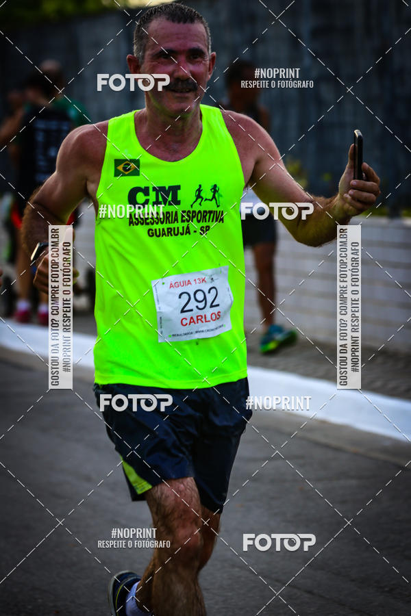 Buy your photos of the eventguia 13K Praia Grande on Fotop