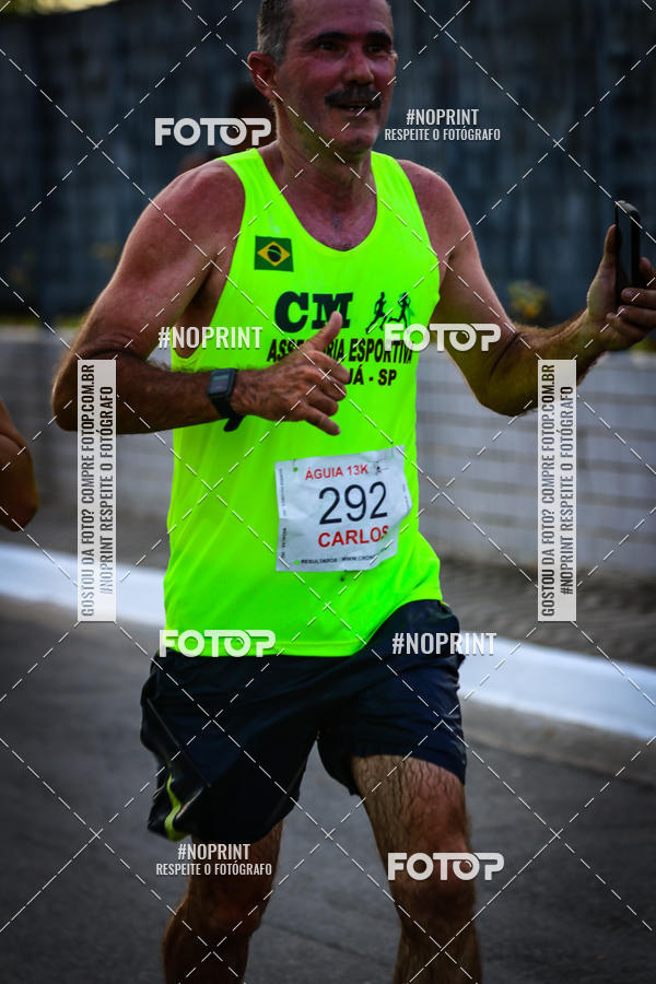 Buy your photos of the eventguia 13K Praia Grande on Fotop