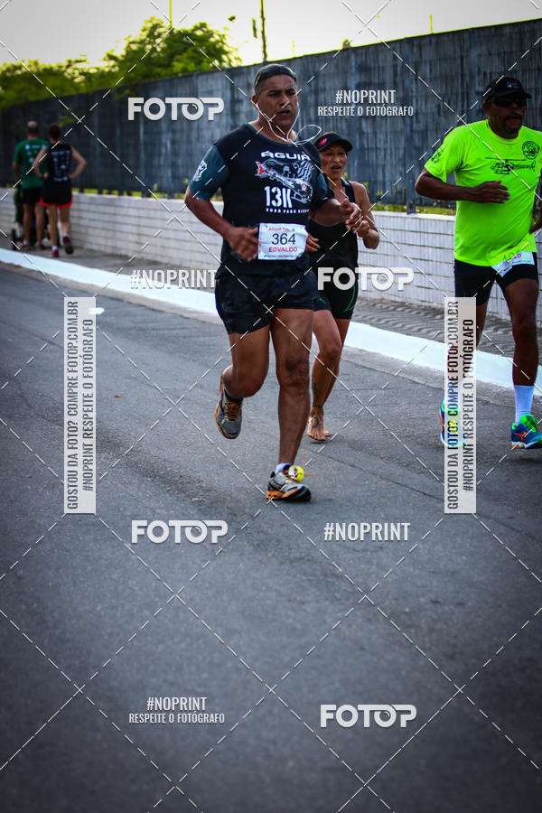 Buy your photos of the eventguia 13K Praia Grande on Fotop