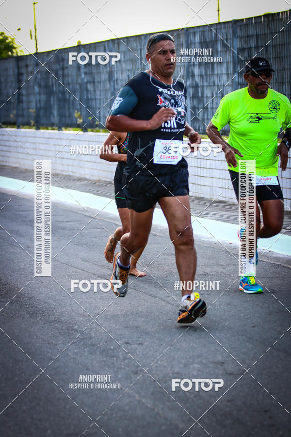 Buy your photos of the eventguia 13K Praia Grande on Fotop