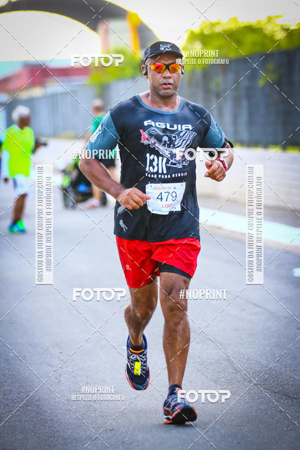 Buy your photos of the eventguia 13K Praia Grande on Fotop