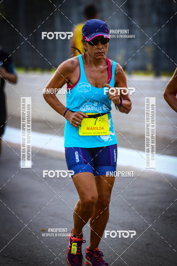 Buy your photos of the eventguia 13K Praia Grande on Fotop