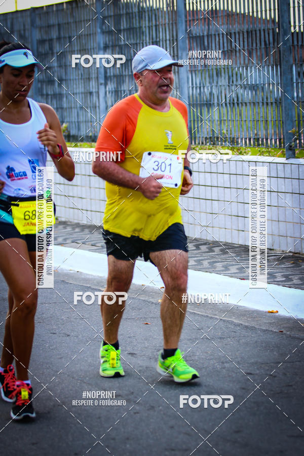 Buy your photos of the eventguia 13K Praia Grande on Fotop