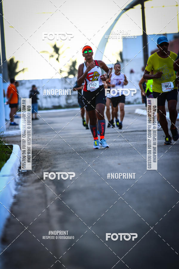 Buy your photos of the eventguia 13K Praia Grande on Fotop