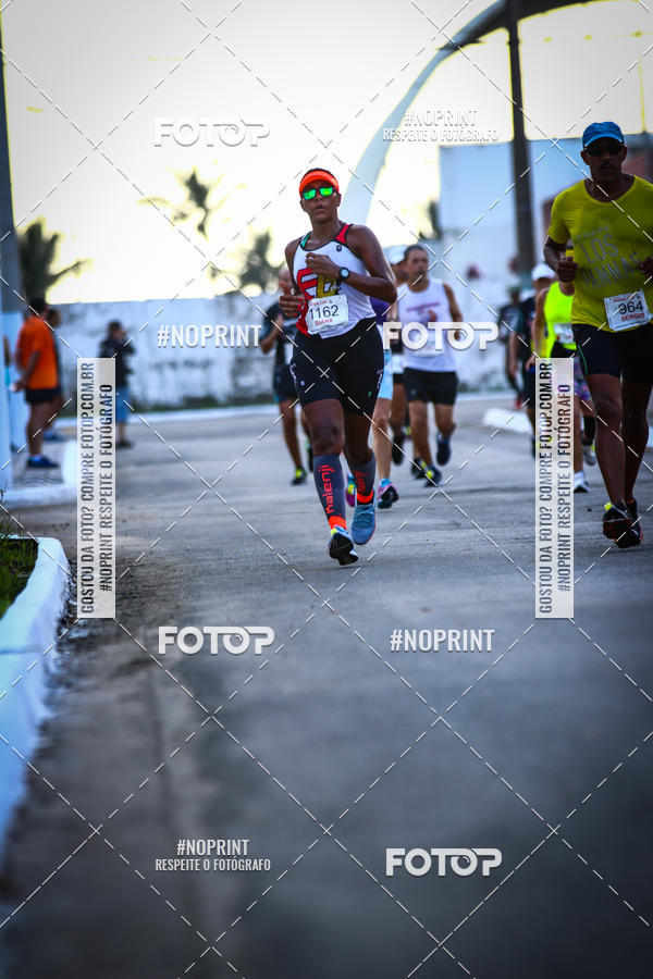 Buy your photos of the eventguia 13K Praia Grande on Fotop