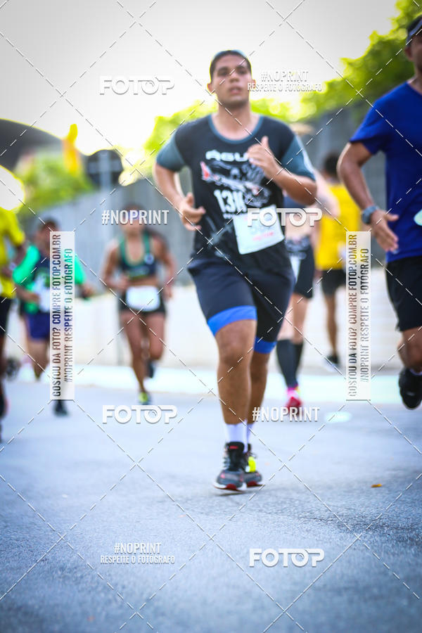 Buy your photos of the eventguia 13K Praia Grande on Fotop
