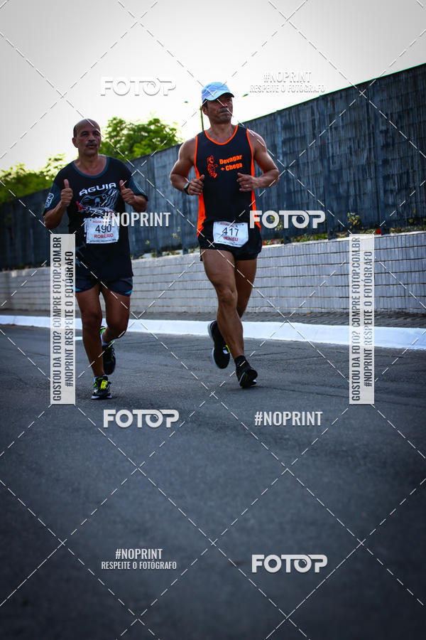 Buy your photos of the eventguia 13K Praia Grande on Fotop