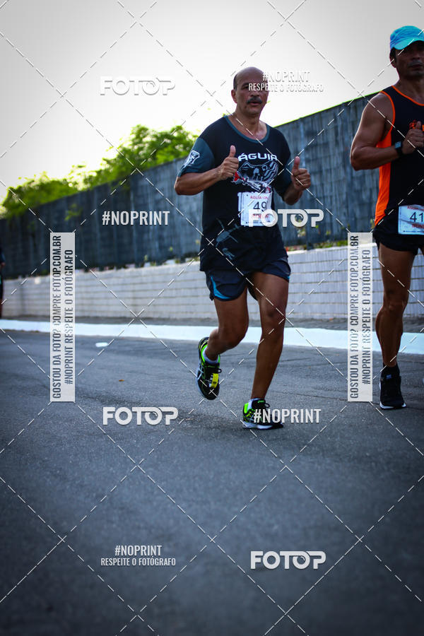 Buy your photos of the eventguia 13K Praia Grande on Fotop