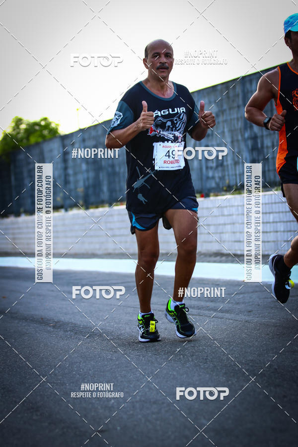 Buy your photos of the eventguia 13K Praia Grande on Fotop