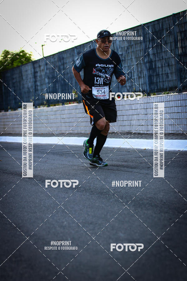 Buy your photos of the eventguia 13K Praia Grande on Fotop