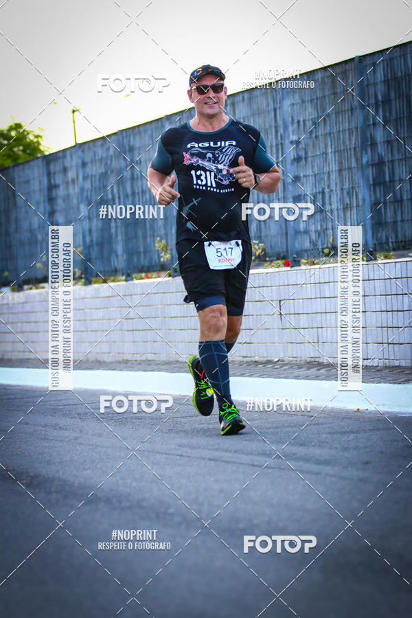 Buy your photos of the eventguia 13K Praia Grande on Fotop
