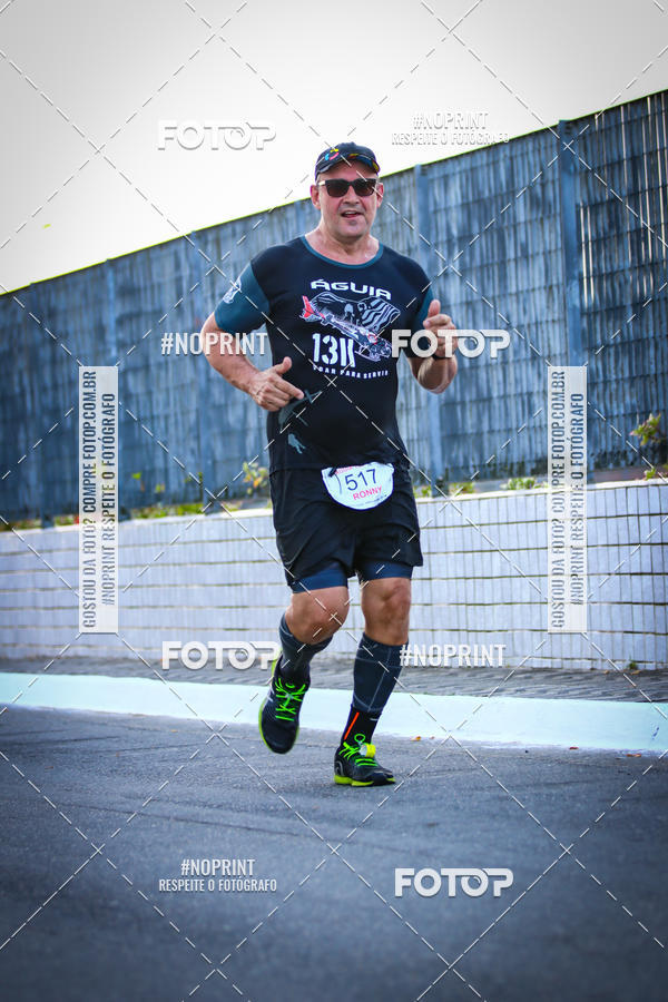 Buy your photos of the eventguia 13K Praia Grande on Fotop