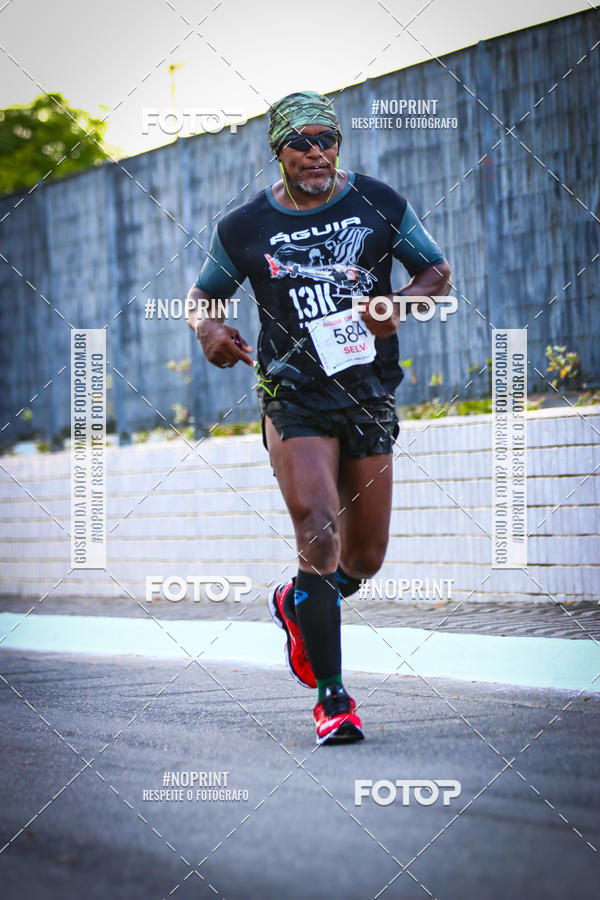 Buy your photos of the eventguia 13K Praia Grande on Fotop