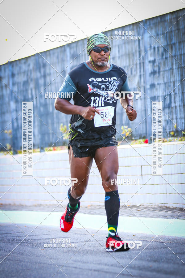 Buy your photos of the eventguia 13K Praia Grande on Fotop