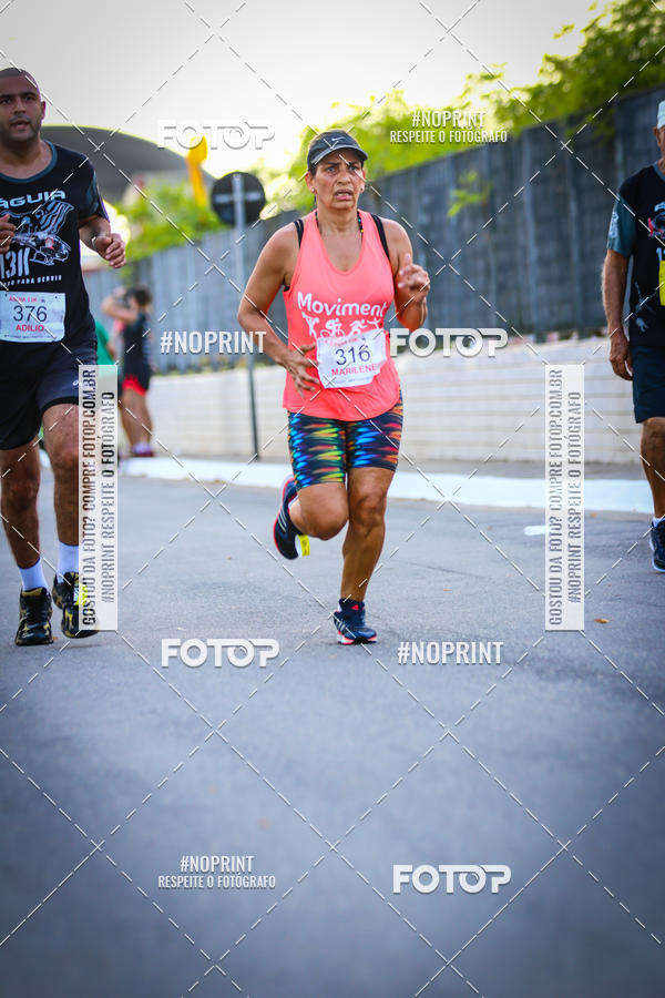 Buy your photos of the eventguia 13K Praia Grande on Fotop
