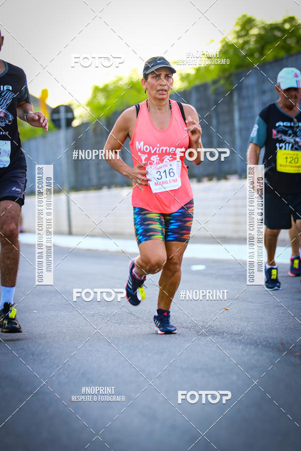 Buy your photos of the eventguia 13K Praia Grande on Fotop